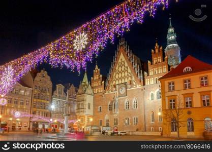 Wroclaw. The central market square at night.. Market Square in colorful illuminations and decorations for Christmas. Wroclaw. Poland.