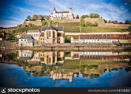 Wurzburg. Main river waterfront and scenic Wurzburg castle and vineyards reflection view, Bavaria region of Germany