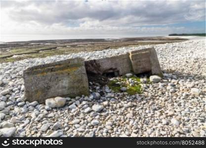 WWII pillbox sinking into Aberthaw beach, South Wales, United Kingdom, Europe