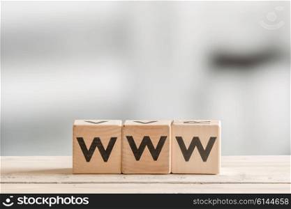 WWW on wooden blocks in a bright room