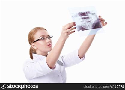 X-ray of a young doctor looks on a white background