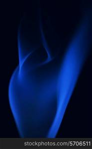 &#x9;Abstract blue smoke on a black background