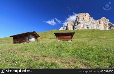 &#x9;barn beneath Sassolungo mount, Fassa Valley, Trentino, Italy