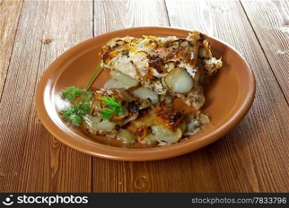 &#x9;farm-style country . baked &#x9;perch with potatoes and onions baked