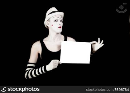 &#x9;mime in striped gloves and hat holding a white blank