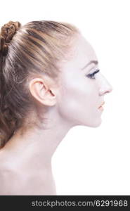 &#x9;profile of beautiful young blond woman with shiny silver makeup on white