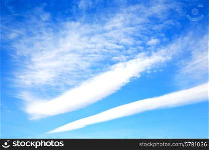 &#xA;in the blue sky white soft clouds and abstract background