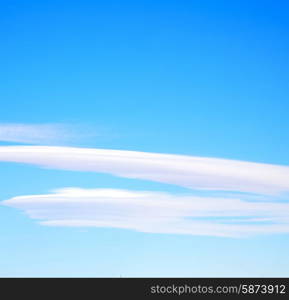 &#xA;in the blue sky white soft clouds and abstract background