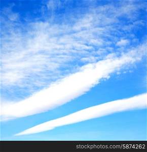&#xA;in the blue sky white soft clouds and abstract background