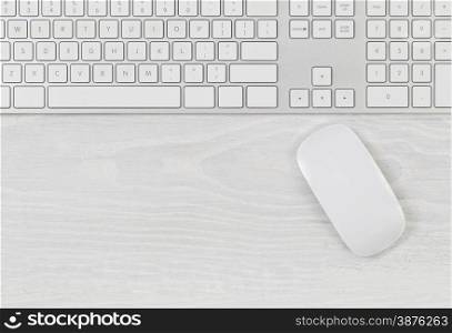 &#xA;White office table with computer keyboard and mouse. Top view with plenty of copy space.&#xA;