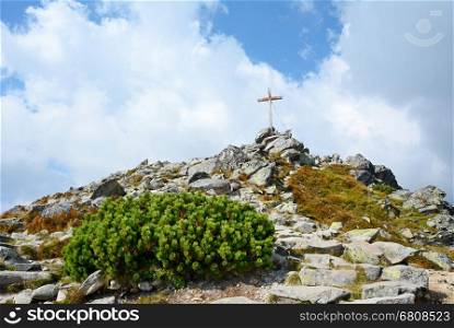 &#xD;&#xA;Wooden cross on top of the Predne Solisko peak in High Tatras mountain.