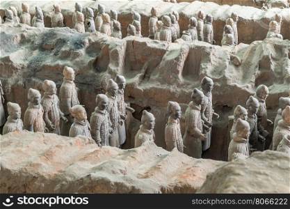 Xian China Historic Restored Terra Cotta Warriors ruin in a museum in Xian.