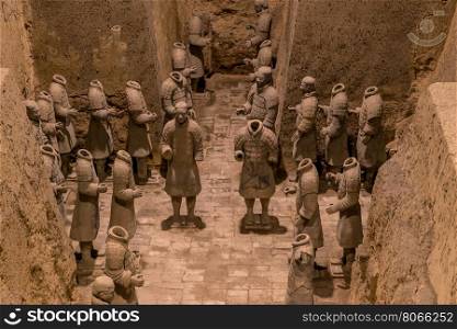 Xian China Historic Restored Terra Cotta Warriors ruin in a museum in Xian.