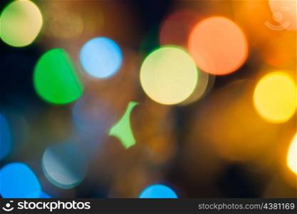 xmas wallpaper of blurred spot of lights, cityscape at night