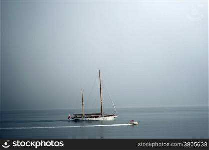 Yacht and boat in Kotor bay at cloudy day, Montenegro