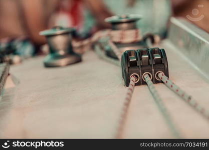 Yacht capstan with rope on sailing boat during cruise, marine objects concept.. Yacht capstan on sailing boat during cruise
