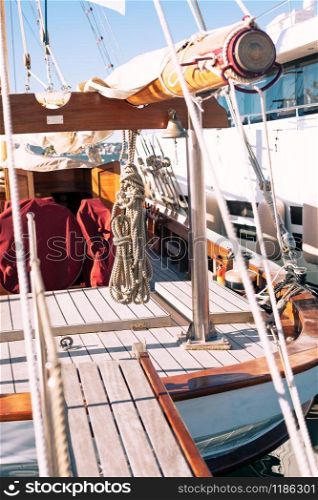 Yacht detail. Rope bundle on a wooden boat