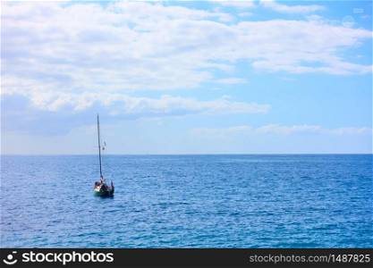 Yacht in the sea on the summer day - seascape