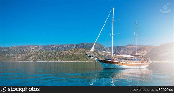 yacht on bay. yacht on bay and castle in Kekova, near ruins of the ancient city on the Kekova island, Turkey