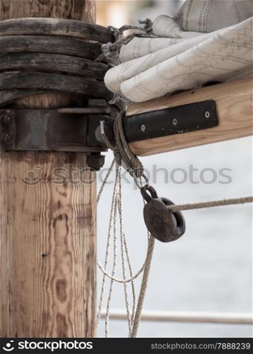 Yachting. Detail image of mast and sail system on yacht sailboat