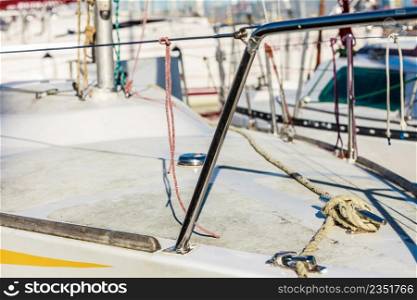 Yachting. Sailboat view of different parts of yacht, block with rope. Detail of a sailing boat