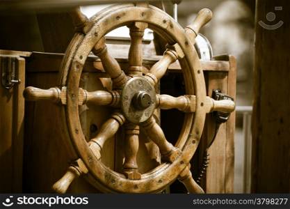 Yachting. Sailboat view of different parts of yacht. Ship wooden old steering wheel.