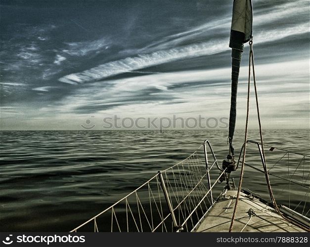 Yachting yacht sailboat sailing in baltic sea at evening summer vacation. Tourism luxury lifestyle. Sepia toned