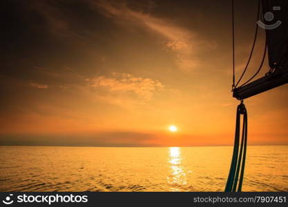 Yachting yacht sailboat sailing in baltic sea at sunset sunrise summer vacation. Tourism luxury lifestyle.