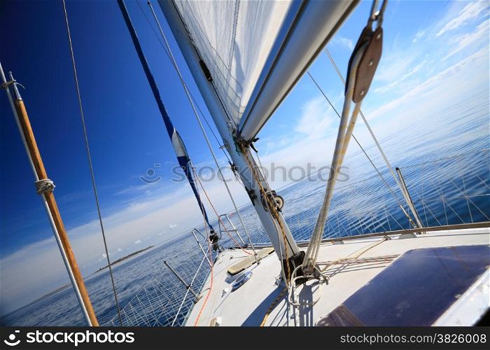 Yachting yacht sailboat sailing in baltic sea blue sky sunny day summer vacation. Tourism luxury lifestyle.