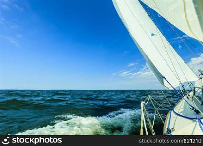 Yachting yacht sailboat sailing in baltic sea blue sky sunny day summer vacation. Tourism luxury lifestyle.. Yachting yacht sailboat sailing in sea ocean