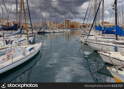 Yachts and fishing boats in the city harbor. Palermo. Sicily. Italy.. Palermo. City Harbor.