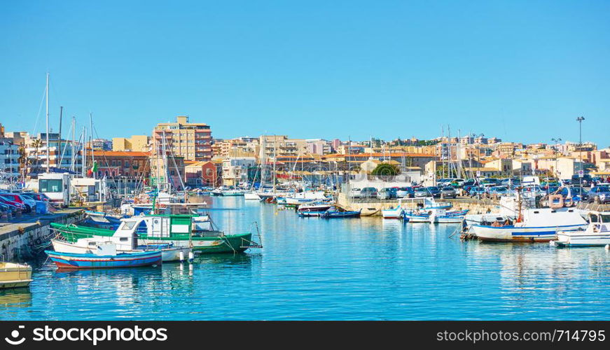 Yachts and fishing boats in the port of Syracuse, Sicily, Italy