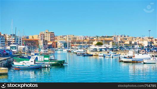 Yachts and fishing boats in the port of Syracuse, Sicily, Italy