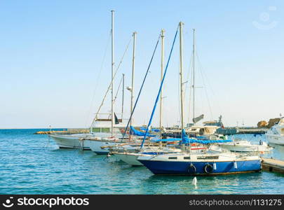 Yachts and motor boats in marina of Larnaca in sunny day, Cyprus