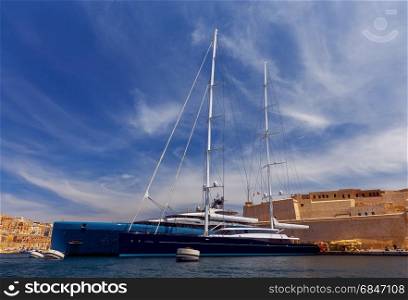 Yachts in the harbor of Valletta.. Luxury sea yachts in the harbor of Valletta. Malta.