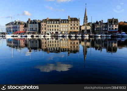 Yachts in the typical harbor of Honfleur