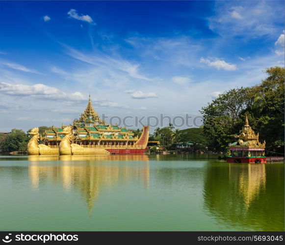 Yangon icon landmark and tourist attraction Karaweik - replica of a Burmese royal barge at Kandawgyi Lake, Yangon, Myanmar Burma