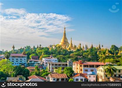Yangon skyline with Shwedagon Pagoda in Myanmar with blue sky