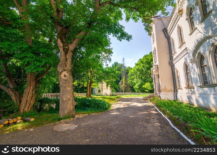 Yard of old Sharovsky manor in summer, Ukraine. Old manor yard