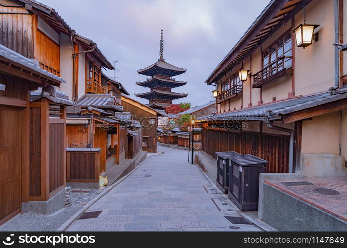 Yasaka Pagoda Temple with japanese houses in travel holidays vacation trip outdoors in Kyoto City, Japan. Tourist attraction at sunrise.