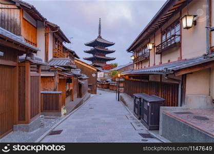 Yasaka Pagoda Temple with japanese houses in travel holidays vacation trip outdoors in Kyoto City, Japan. Tourist attraction at sunrise.
