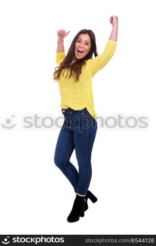Yeah! Sooo happy!. Studio shot: Happy woman with raised arms