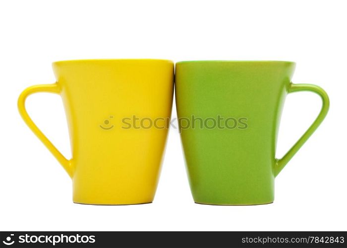 yellow and green mug on a white background
