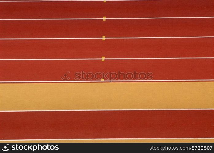 yellow and red athletics race track detail