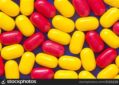 yellow and red candy mints breath freshener