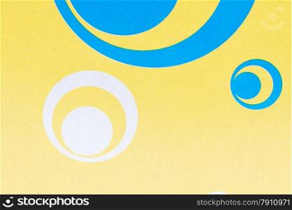 yellow background with blue round