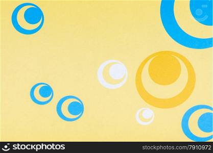 yellow background with blue round