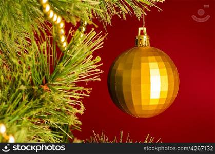 yellow ball on christmas tree