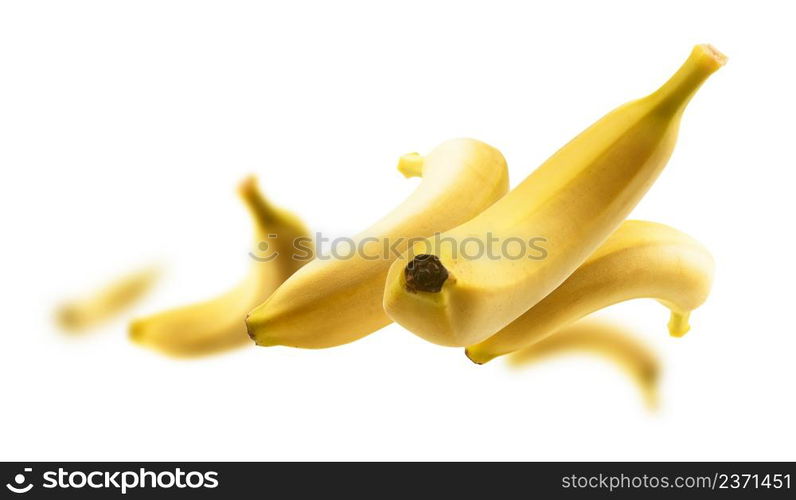 Yellow bananas levitate on a white background.. Yellow bananas levitate on a white background