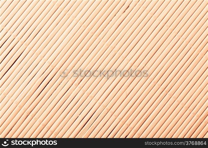 Yellow beige bamboo mat surface pattern diagonal background texture.